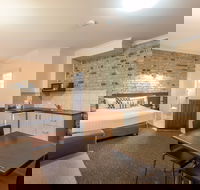 Highlander Motor Inn and Apartments - Accommodation VIC