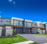 Escape At Nobbys Executive Townhouse 1 74 Pacific Drive - Accommodation VIC