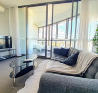 Luxury Level 2-bed 2-bath City View Apt in Olympic Park - Accommodation VIC